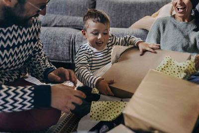 Boy opens a holiday gift