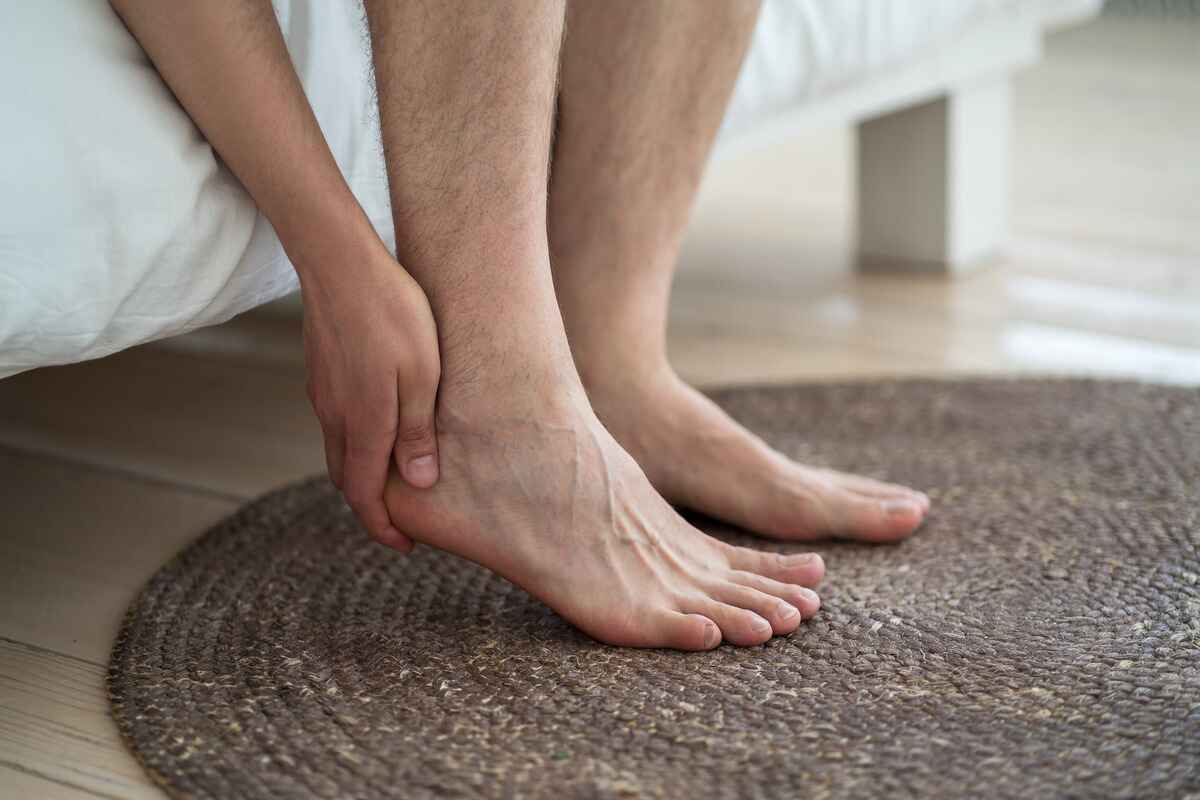person with gout pain in foot