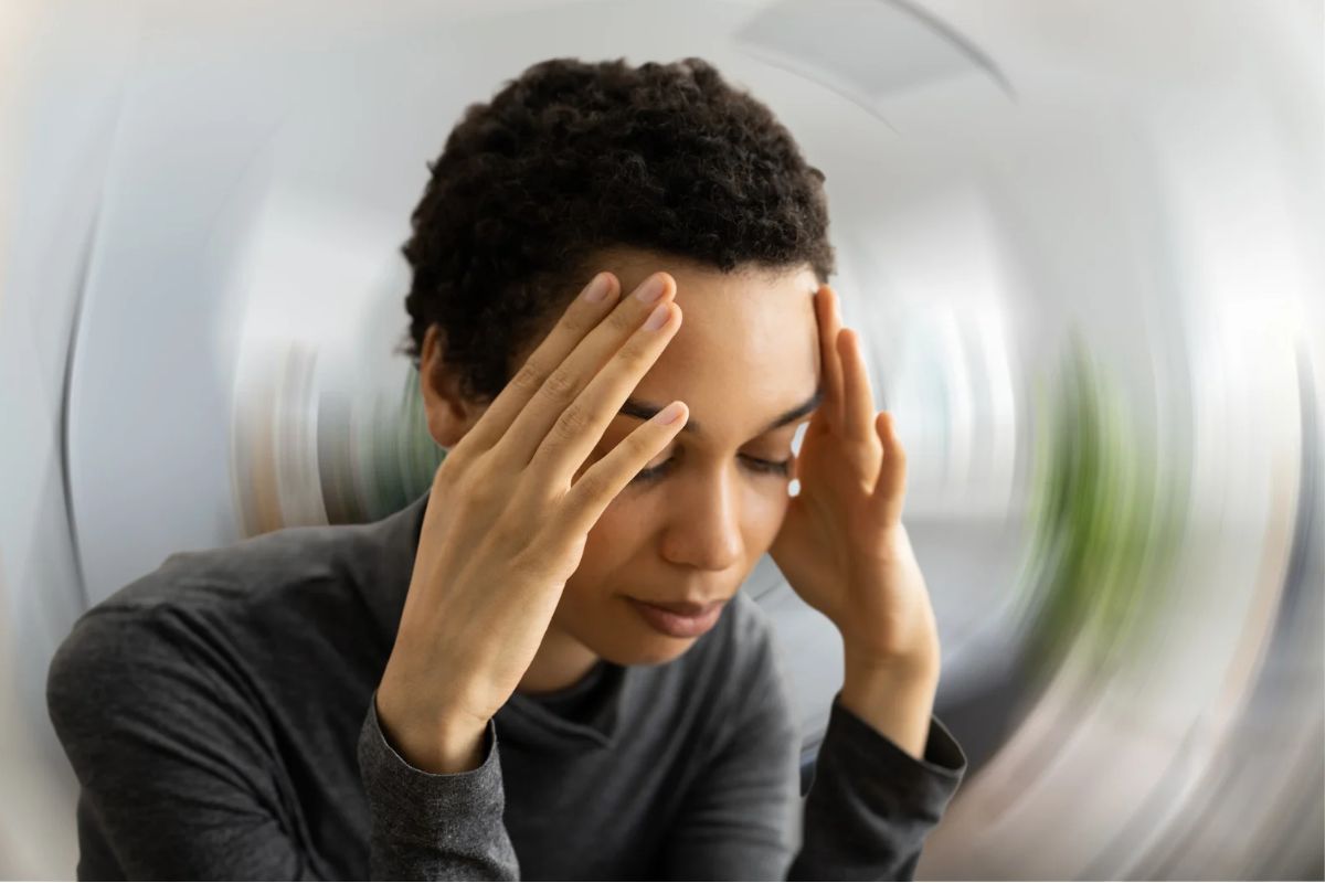 woman with pots experiences dizziness