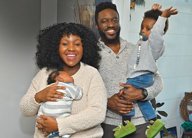 Shirley and Corey Toby of White Plains, NY, with their growing family