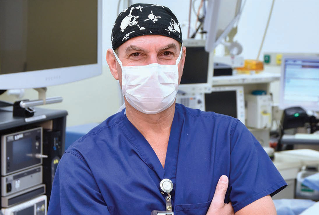 Yale Medicine orthopedist Craig Tifford, MD, prepares to perform an outpatient procedure