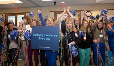 Nurses, staff and leaders burst into cheers upon learning that Greenwich Hospital
