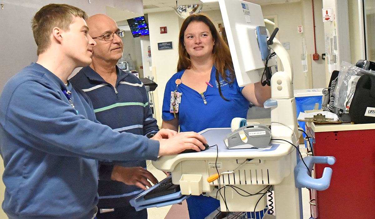 Wendell Frink, RN; Nader Bahadory, DO, medical director; and Bethany Gingerella, RN