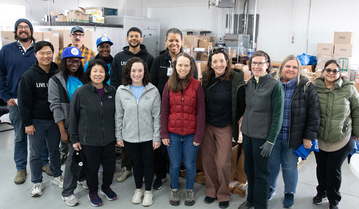 Yale New Haven Health employees joined volunteers from community organizations to fill bags for the School Break Groceries initiative
