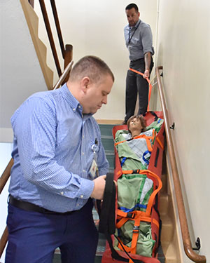 practiced using emergency evacuation sleds 