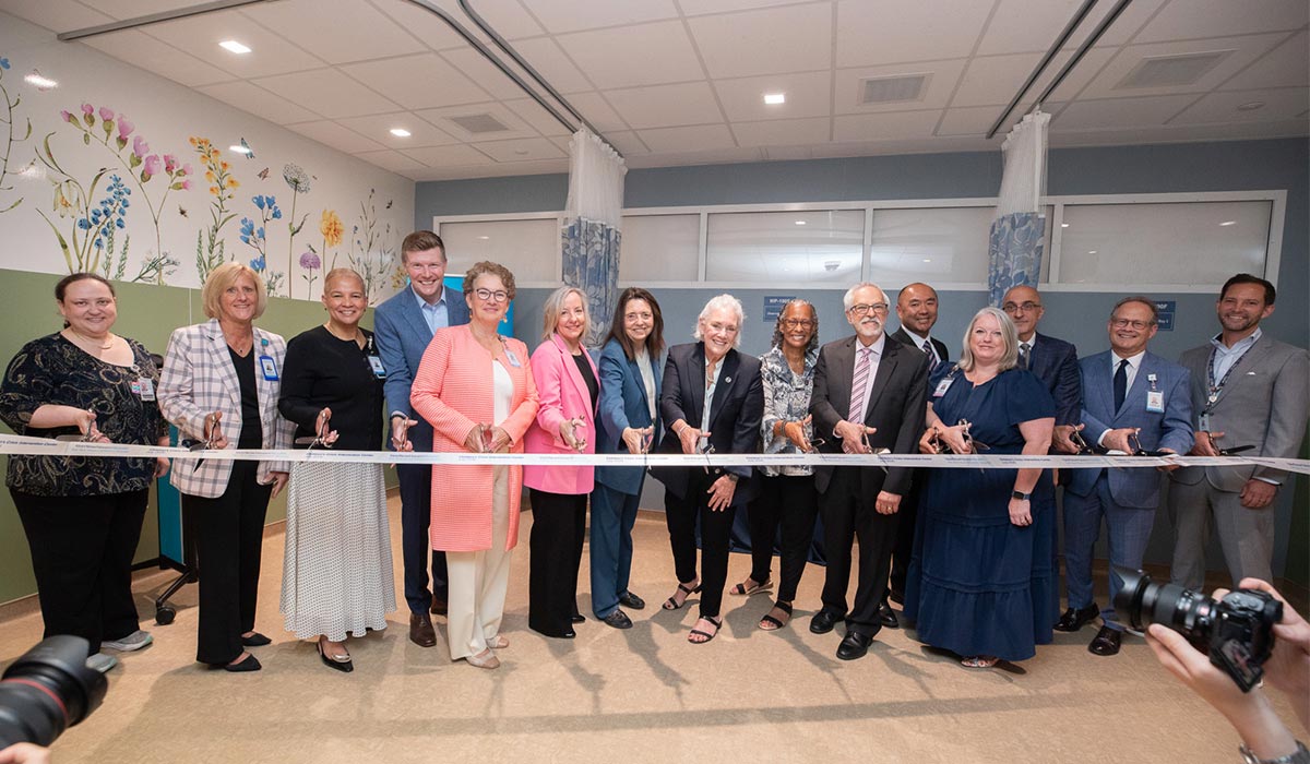 YNHHS leaders helped cut the ribbon