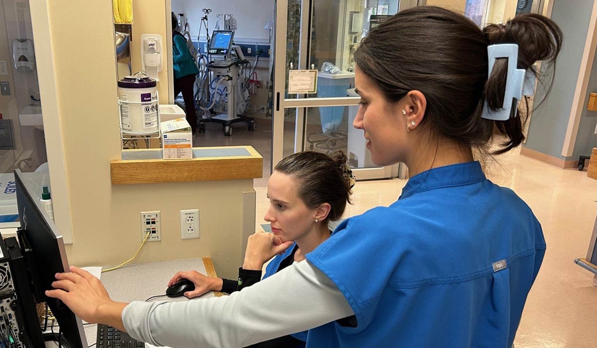 Kayla Billington, RN (seated), and Veronica Vodola, RN