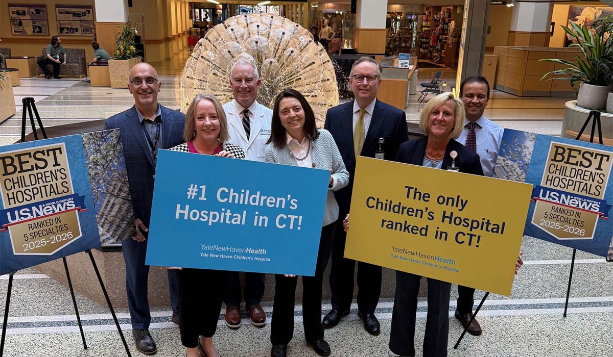 Our health system billboards celebrate word that U.S. News & World Report ranked Yale New Haven Children’s Hospital (YNHCH) as the #1 children’s hospital in Connecticut and #2 in New England – and the only Connecticut hospital to be ranked. Pictured (l-r) are: Matthew Bizzarro, MD, chief medical officer, YNHCH, and vice chair, Clinical Affairs, Department of Pediatrics, Yale School of Medicine (YSM); Beth Hines, senior vice president, Women’s and Children’s Services, YNHH; Michael Caty, MD, surgeon-in-chief, YNHCH, and chief of Pediatric Surgery, YSM; Linda Mayes, MD, professor of Child Psychiatry, Pediatrics and Psychology, and chair, Child Study Center, YSM; Clifford Bogue, MD, chief of Pediatrics, YNHHS, and chair of Pediatrics, YSM; Lynne Sherman, RN, vice president, Patient Services, YNHCH; and Dinesh Pashankar, MD, director of IBD Program, YNHCH, and professor, Pediatrics, YSM. 