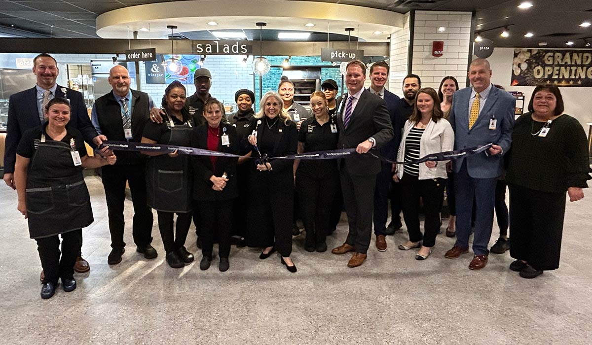 Bridgeport Hospital leaders helped cut the ribbon for the new Eat Café and Micro Market in the hospital lobby. 
